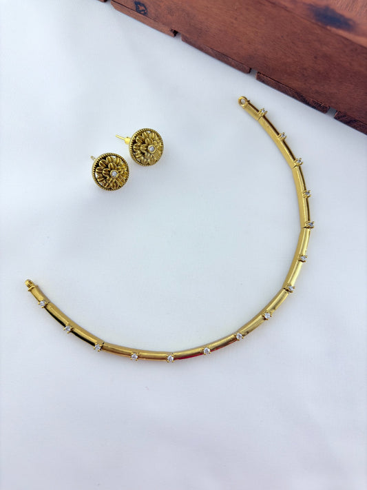 Premium matte finish neckset and matching studs adorned with AD stones