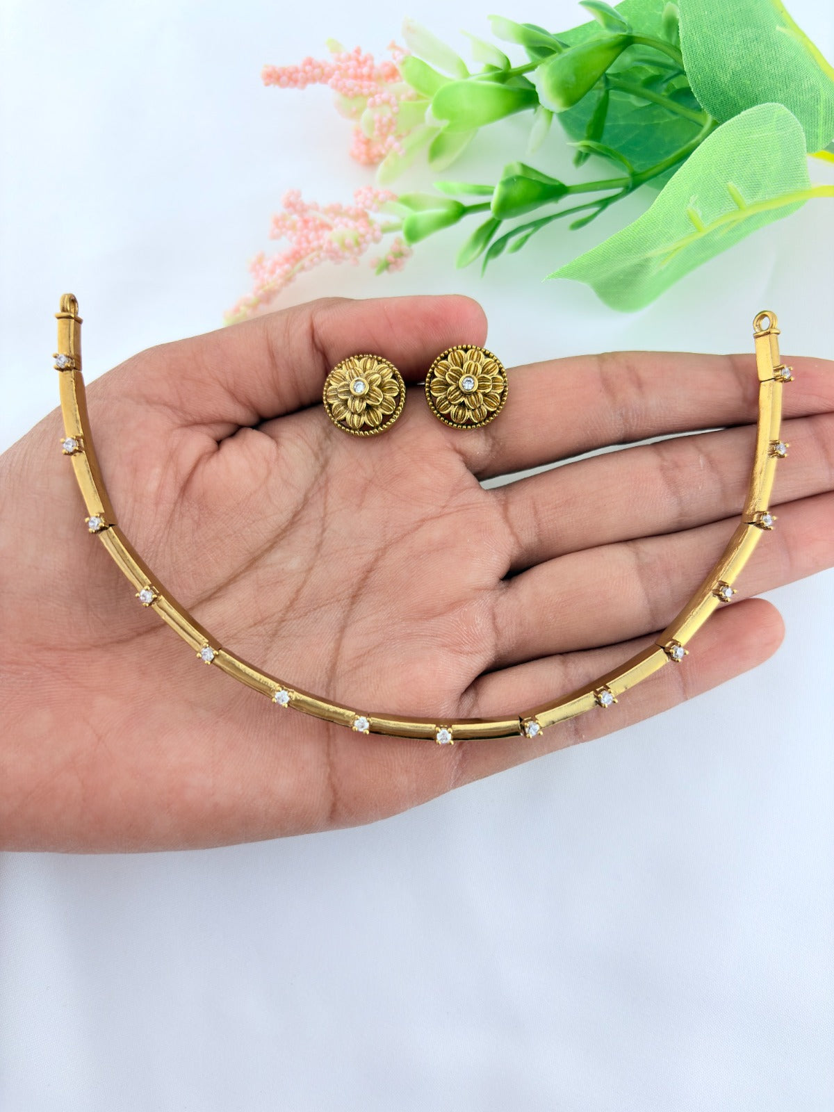 Premium matte finish neckset and matching studs adorned with AD stones