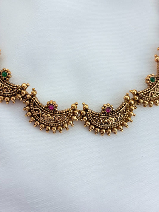 Half moon shaped Matte finish necklace set paired with matching earrings