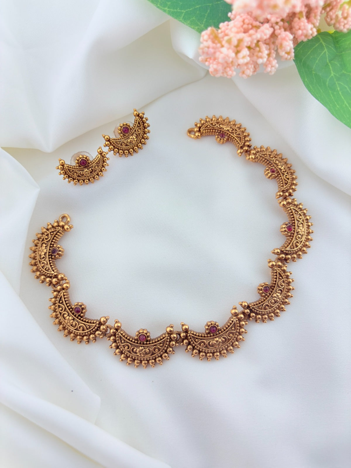 Half moon shaped Matte finish necklace set paired with matching earrings