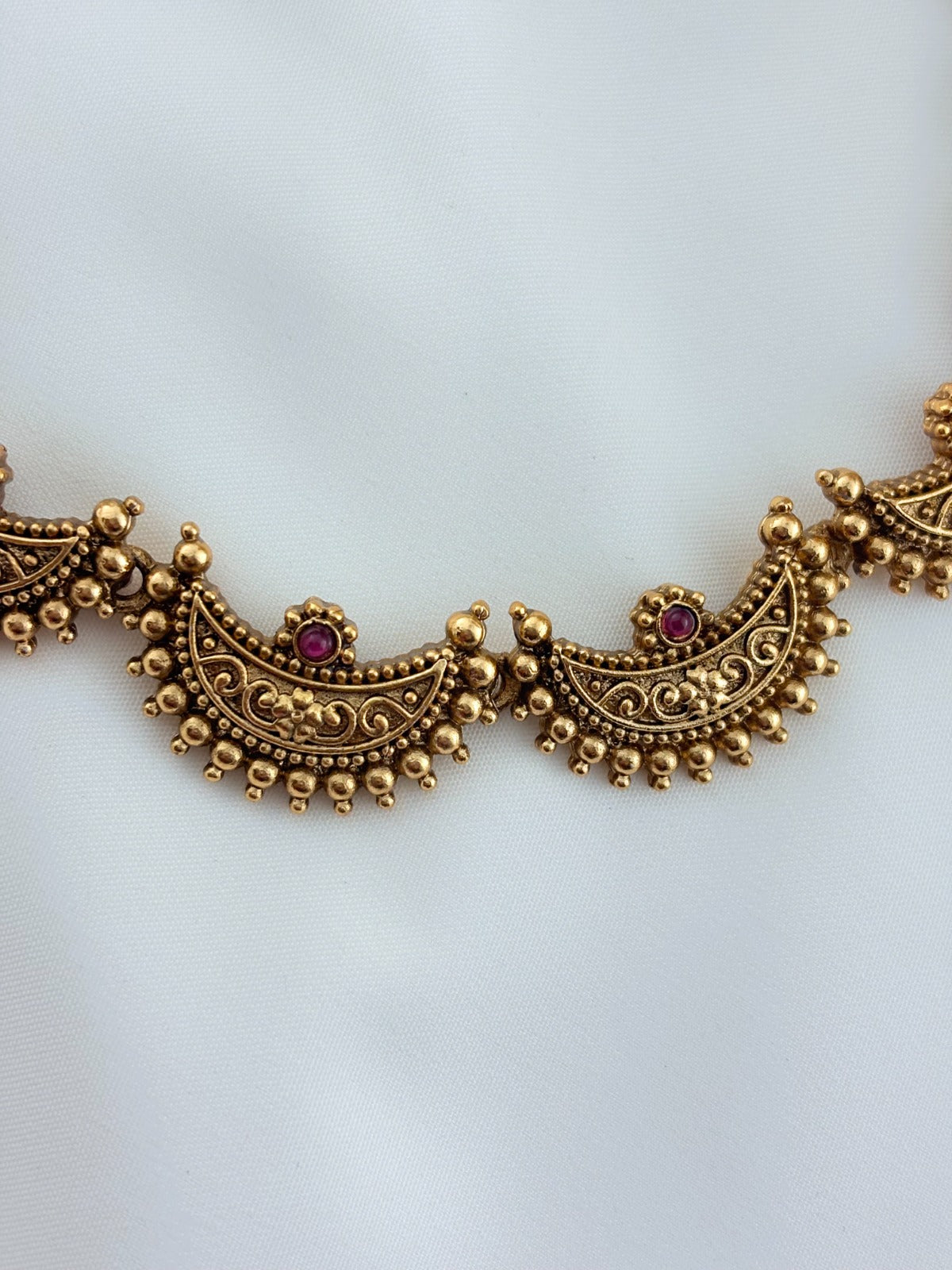 Half moon shaped Matte finish necklace set paired with matching earrings