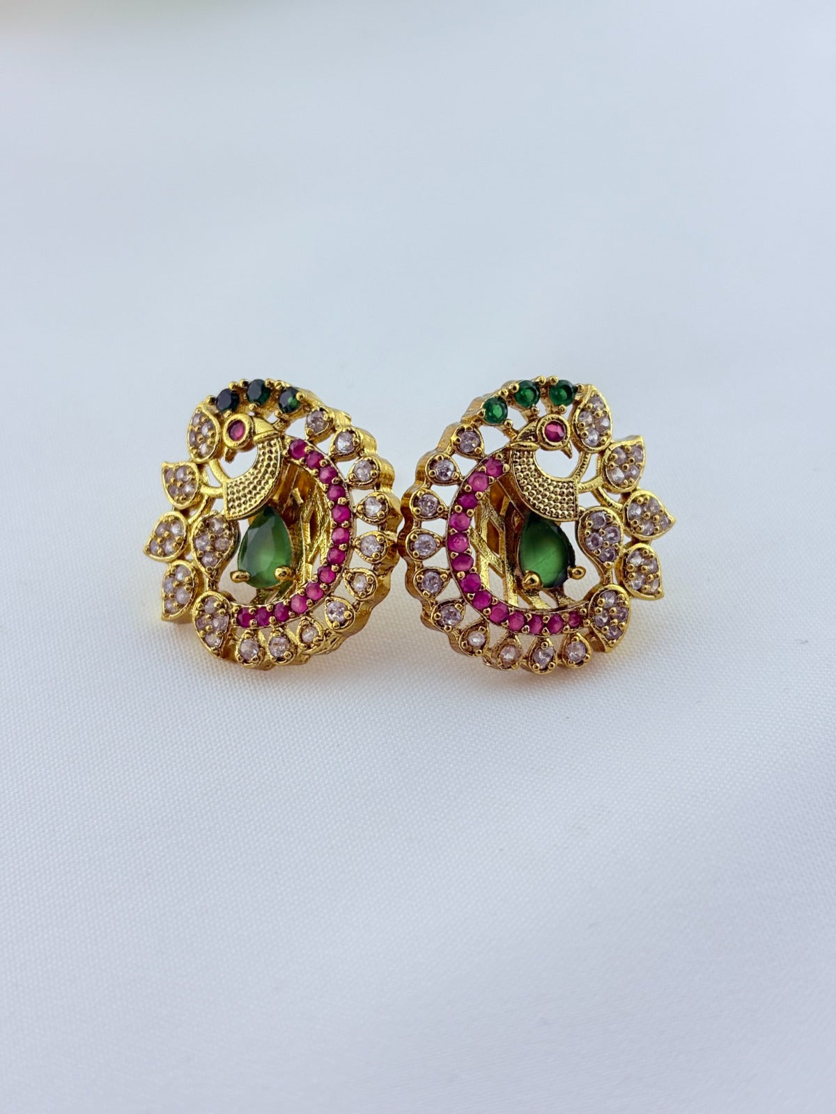 Elegant peacock motif pendant choker paired with matching earrings