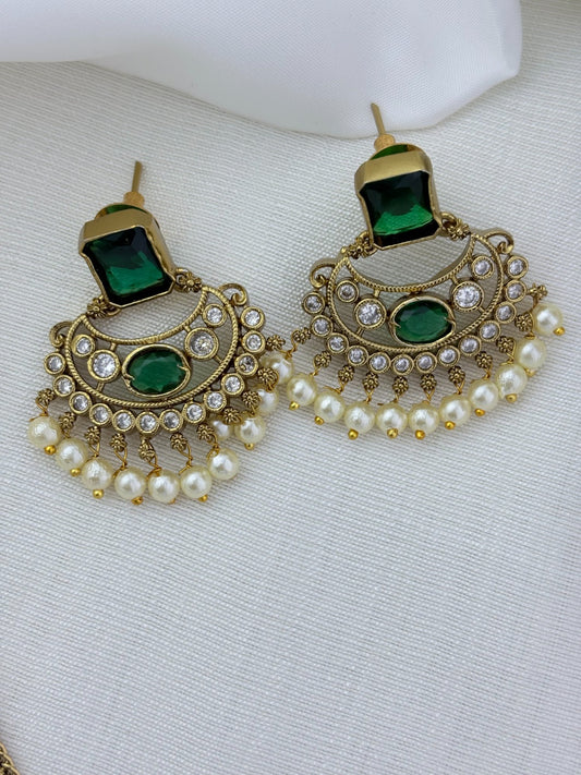 Traditional elegance added to a modern trendy style - Premium matte finish necklace and earrings adorned with classic stones and pearls