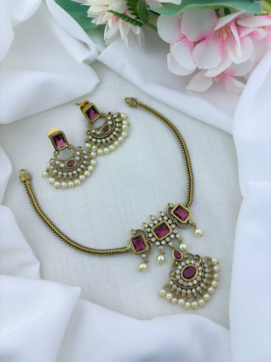 Traditional elegance added to a modern trendy style - Premium matte finish necklace and earrings adorned with classic stones and pearls