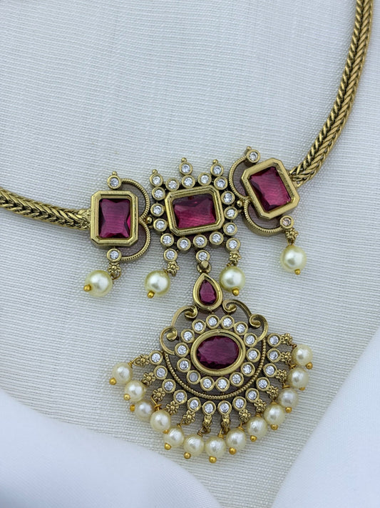 Traditional elegance added to a modern trendy style - Premium matte finish necklace and earrings adorned with classic stones and pearls