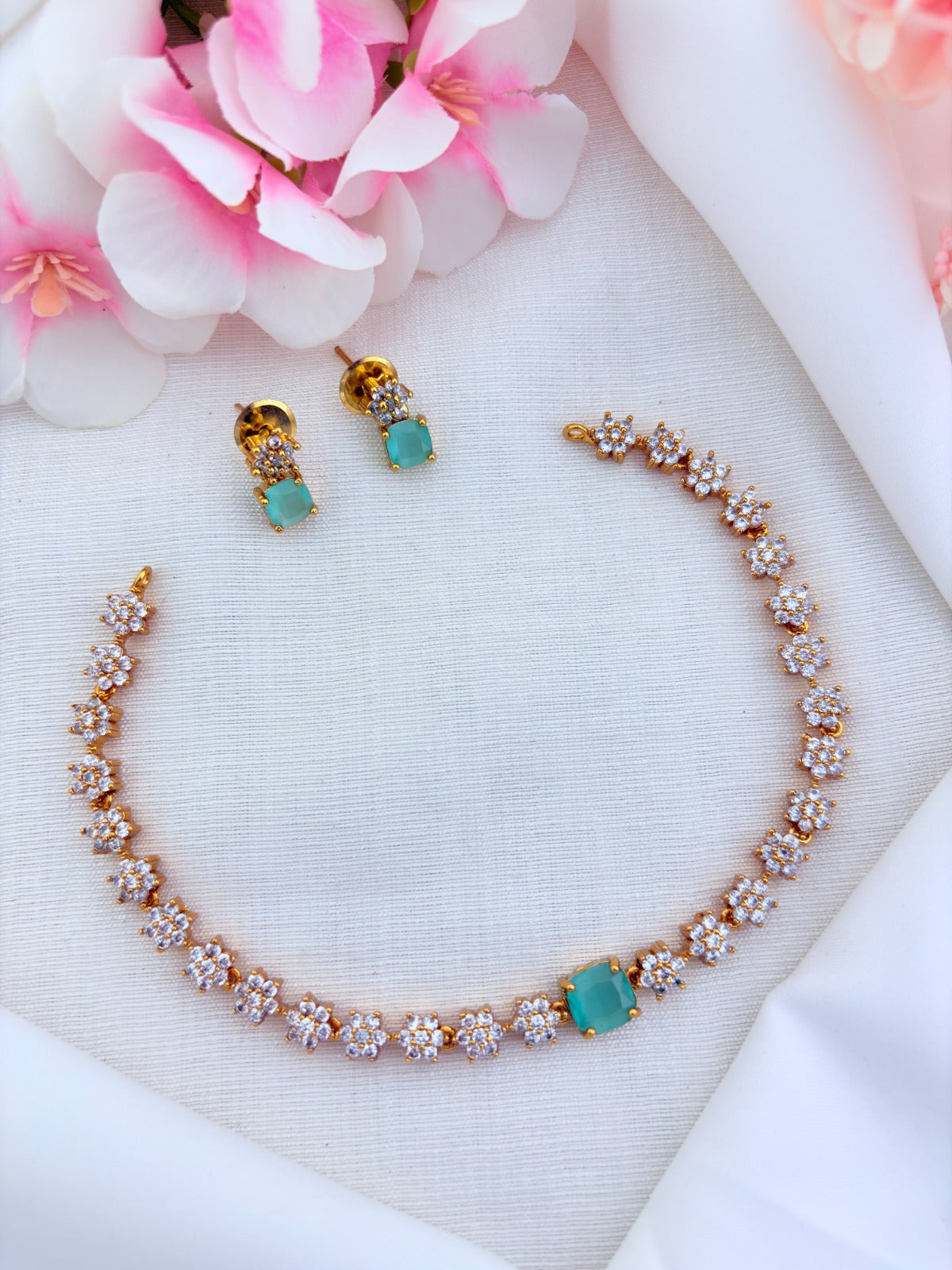 Premium matte finish floral pattern necklace beautifully crafted with AD stones