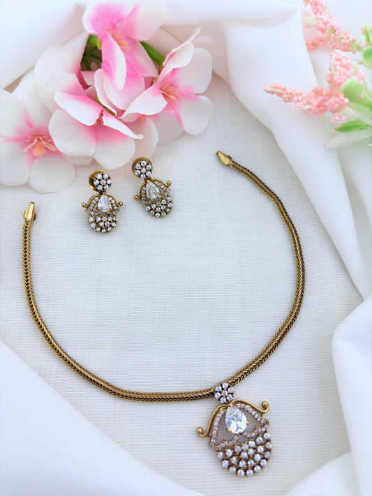 Premium matte finish necklace and earrings adorned with classic AD stones