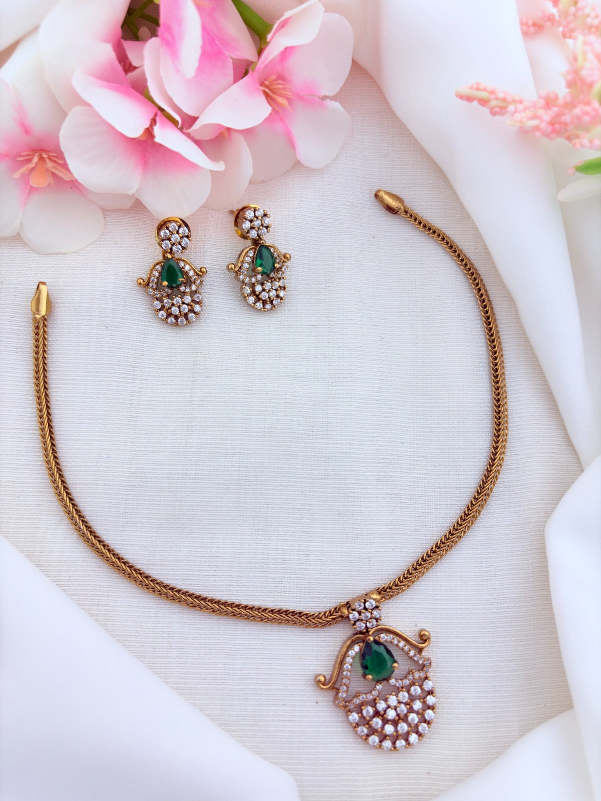 Premium matte finish necklace and earrings adorned with classic AD stones