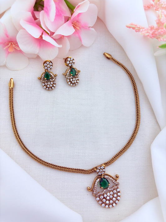 Premium matte finish necklace and earrings adorned with classic AD stones