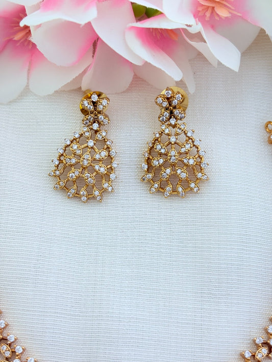 Style in modern tradition - Premium matte finish necklace and earrings beautifully crafted with AD stones