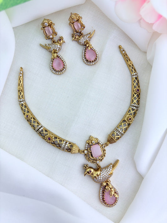 Premium matte finish hasli neckset featuring a graceful peacock pendant, beautifully adorned with AD stones