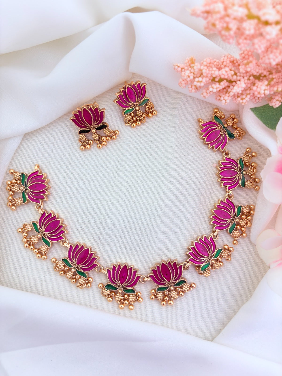 Elegant matte finish lotus necklace beautifully crafted  with detailed enamel work and golden beads