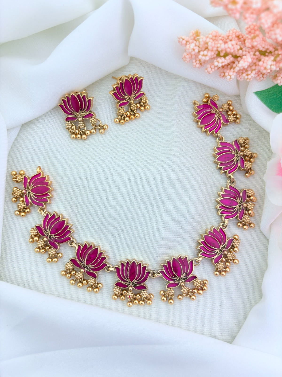 Elegant matte finish lotus necklace beautifully crafted  with detailed enamel work and golden beads
