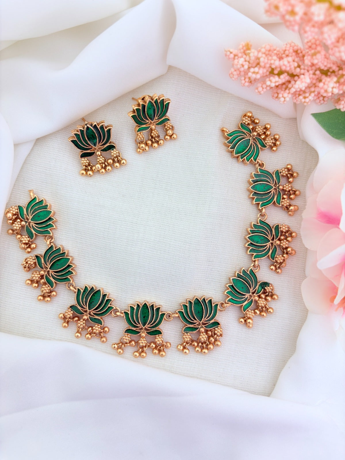 Elegant matte finish lotus necklace beautifully crafted  with detailed enamel work and golden beads