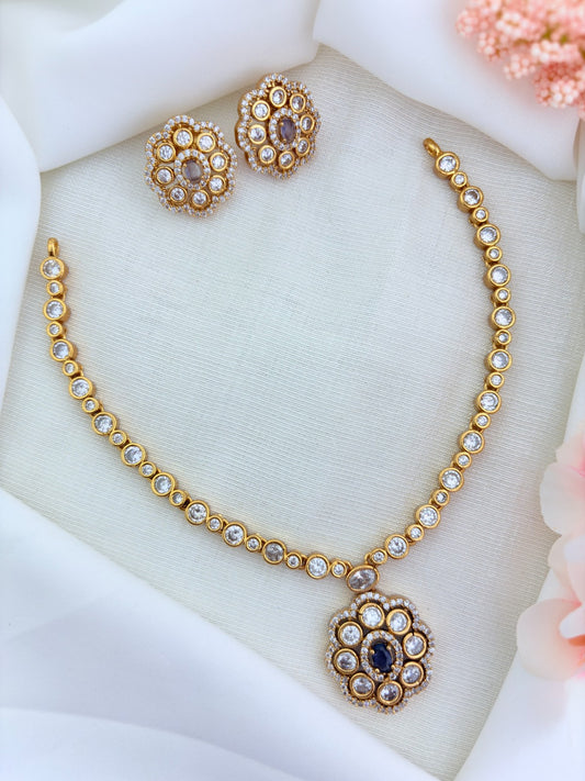 Classic matte finish floral pendant necklace and earrings  adorned with  CZ stones