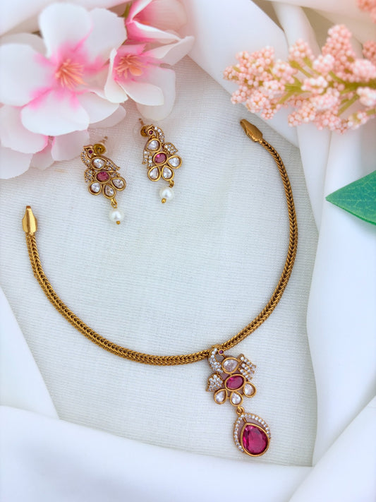 Elegant premium matte finish Peacock and floral pattern pendant beautifully adorned with classic AD stones