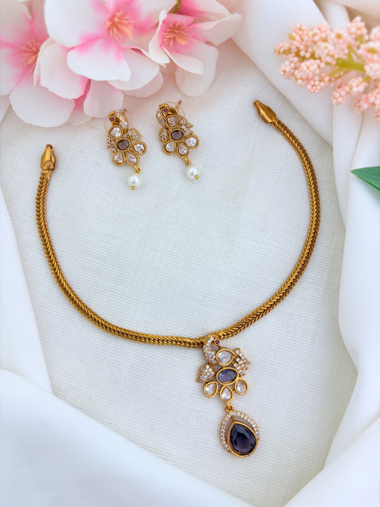 Elegant premium matte finish Peacock and floral pattern pendant beautifully adorned with classic AD stones