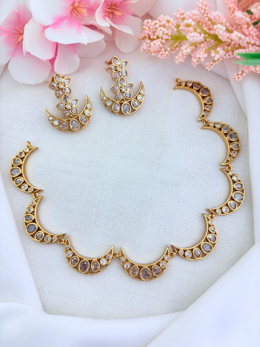 Stylish premium matte finish Half moon shaped necklace beautifully adorned with AD stones