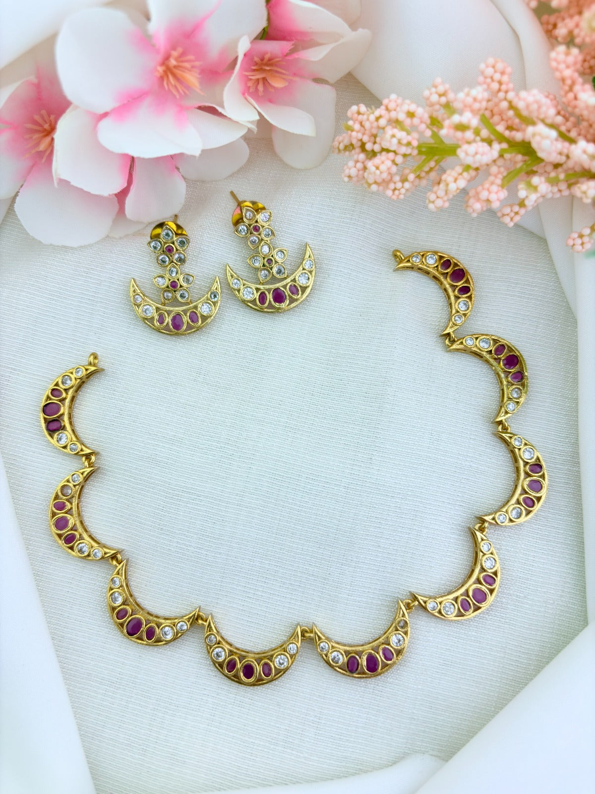 Stylish premium matte finish Half moon shaped necklace beautifully adorned with AD stones