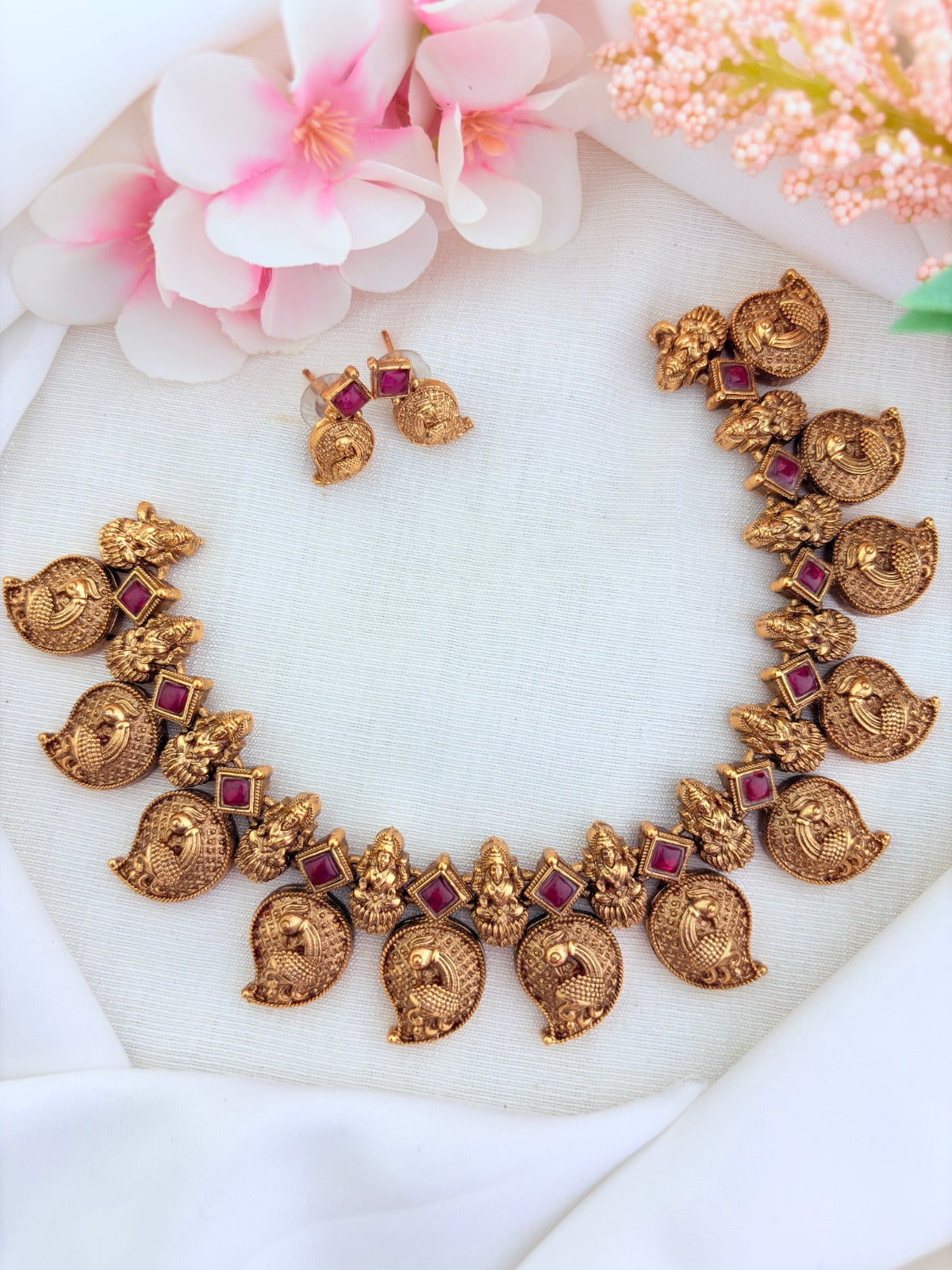 Timeless traditional mango and laskhmi design necklace with matching earrings