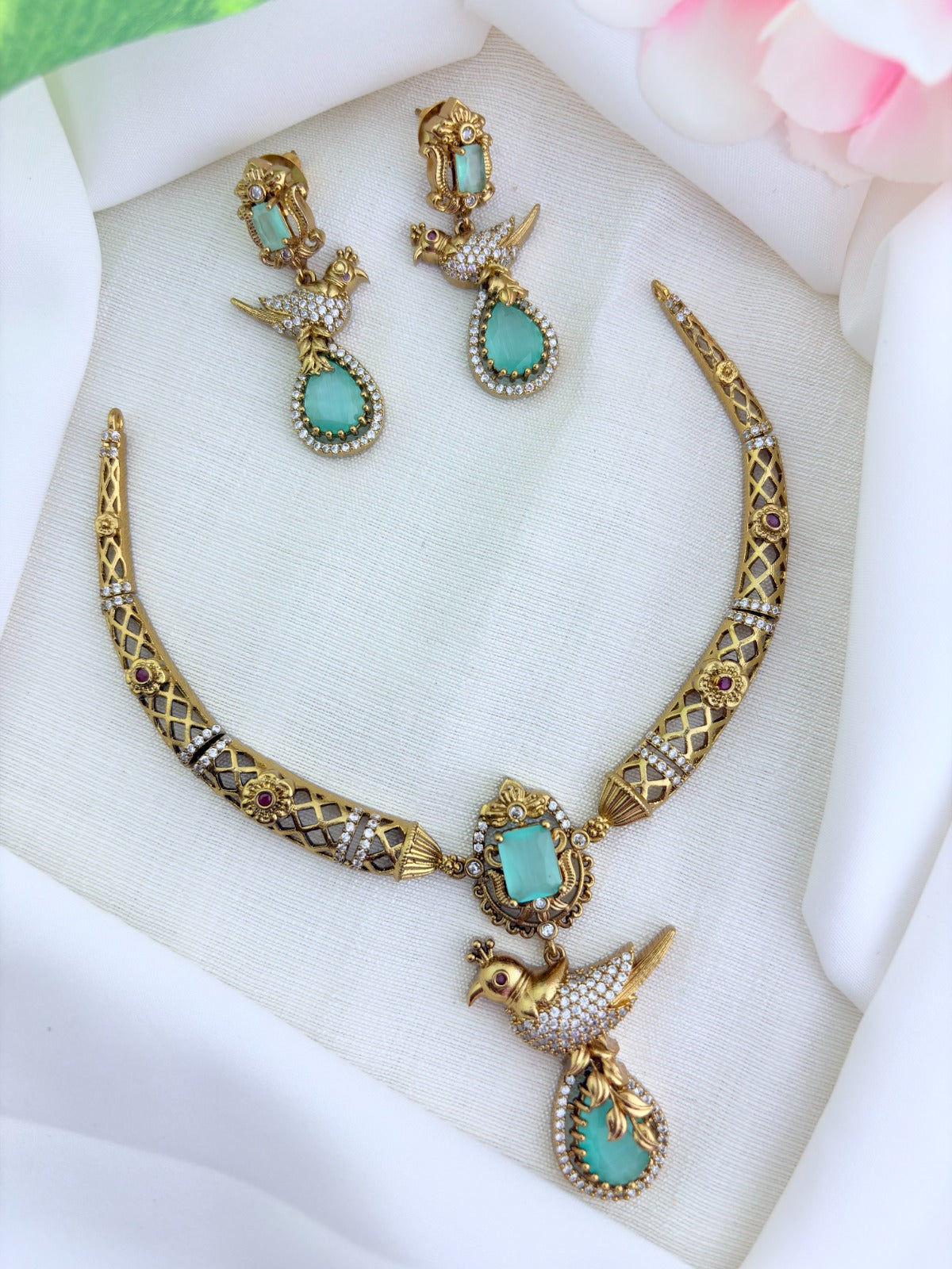 Premium matte finish hasli neckset featuring a graceful peacock pendant, beautifully adorned with AD stones