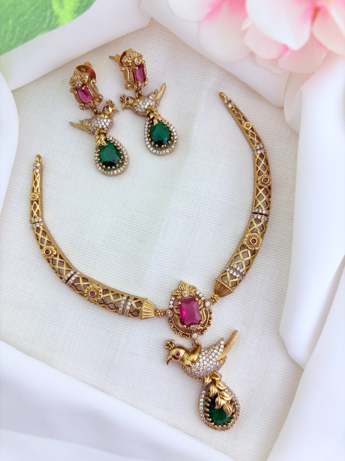 Premium matte finish hasli neckset featuring a graceful peacock pendant, beautifully adorned with AD stones