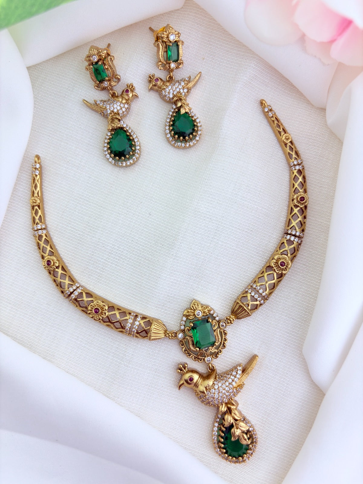 Premium matte finish hasli neckset featuring a graceful peacock pendant, beautifully adorned with AD stones