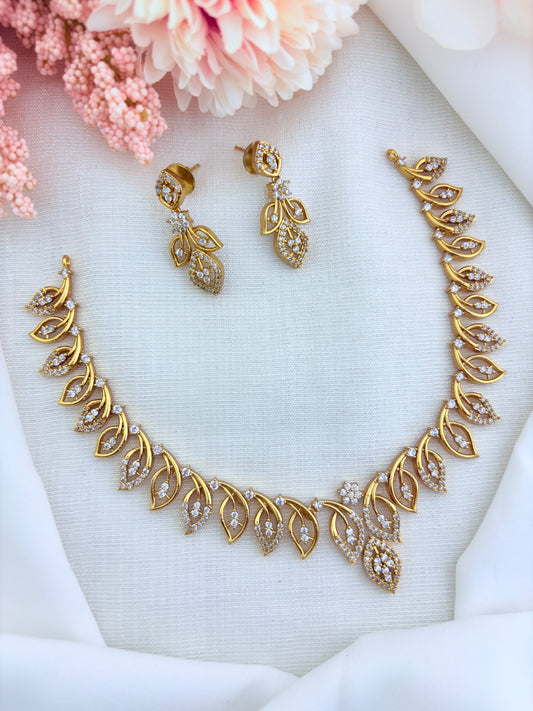Elegant leaf motif design in premium matte finish necklace adorned with AD stones