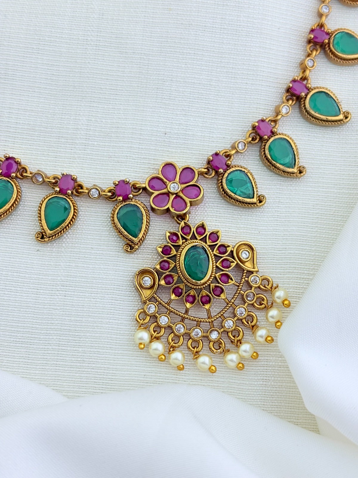 Elegant palak design necklace in premium matte finish adorned with pearl drops