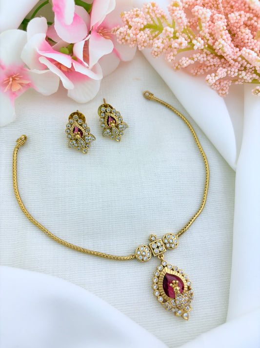 Beautifully crafted peacock pendant featuring AD stones in premium matte finish with matching earrings