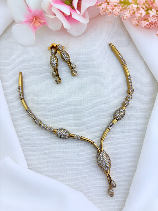 Style in modern elegance - premium matte antique polish necklace and earrings adorned with AD stones