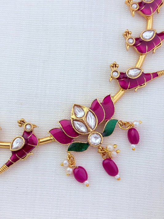 Peacock and lotus design combined in a single premium matte necklace with rich enamel detailing and matching earrings