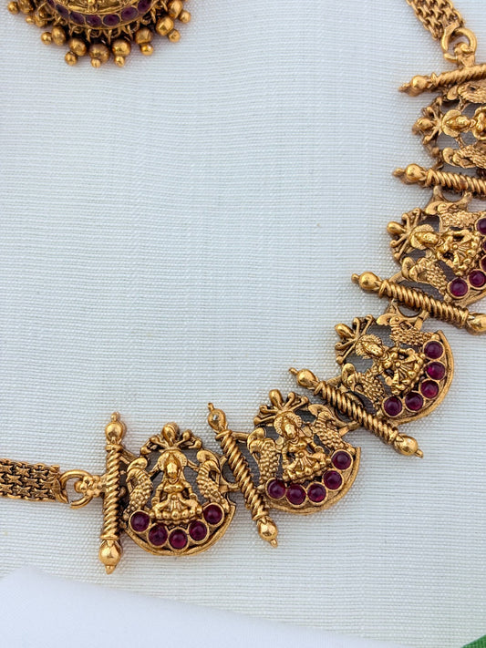 Matte finish Lakshmi choker and matching jumkha adorned with stones and golden beads