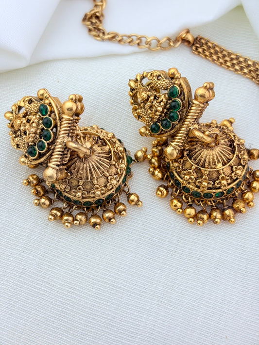 Matte finish Lakshmi choker and matching jumkha adorned with stones and golden beads