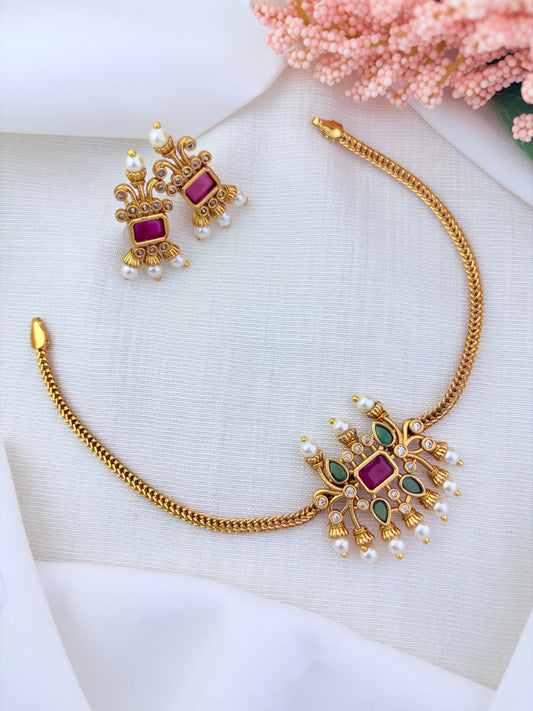 Traditional pattern  premium matte finish necklace and matching earrings crafted with stones and pearls